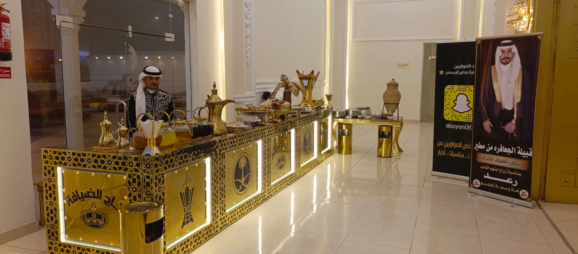 فريق قهوجيين ومباشرين أثناء خدمة مناسبة بالطائف